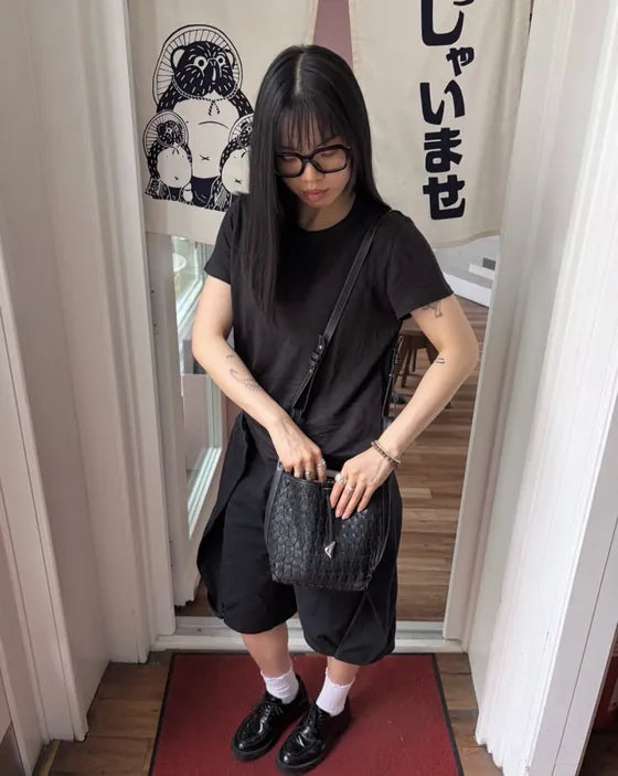 Customer photo of the black moon shorts layering piece